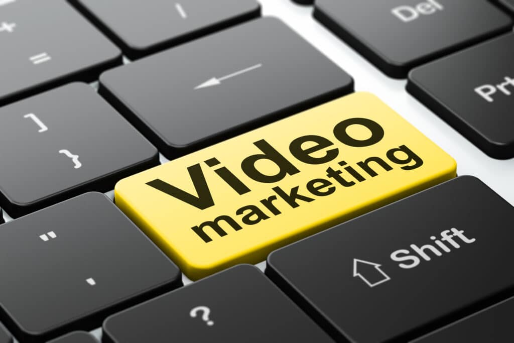 Business concept: Video Marketing on computer keyboard background